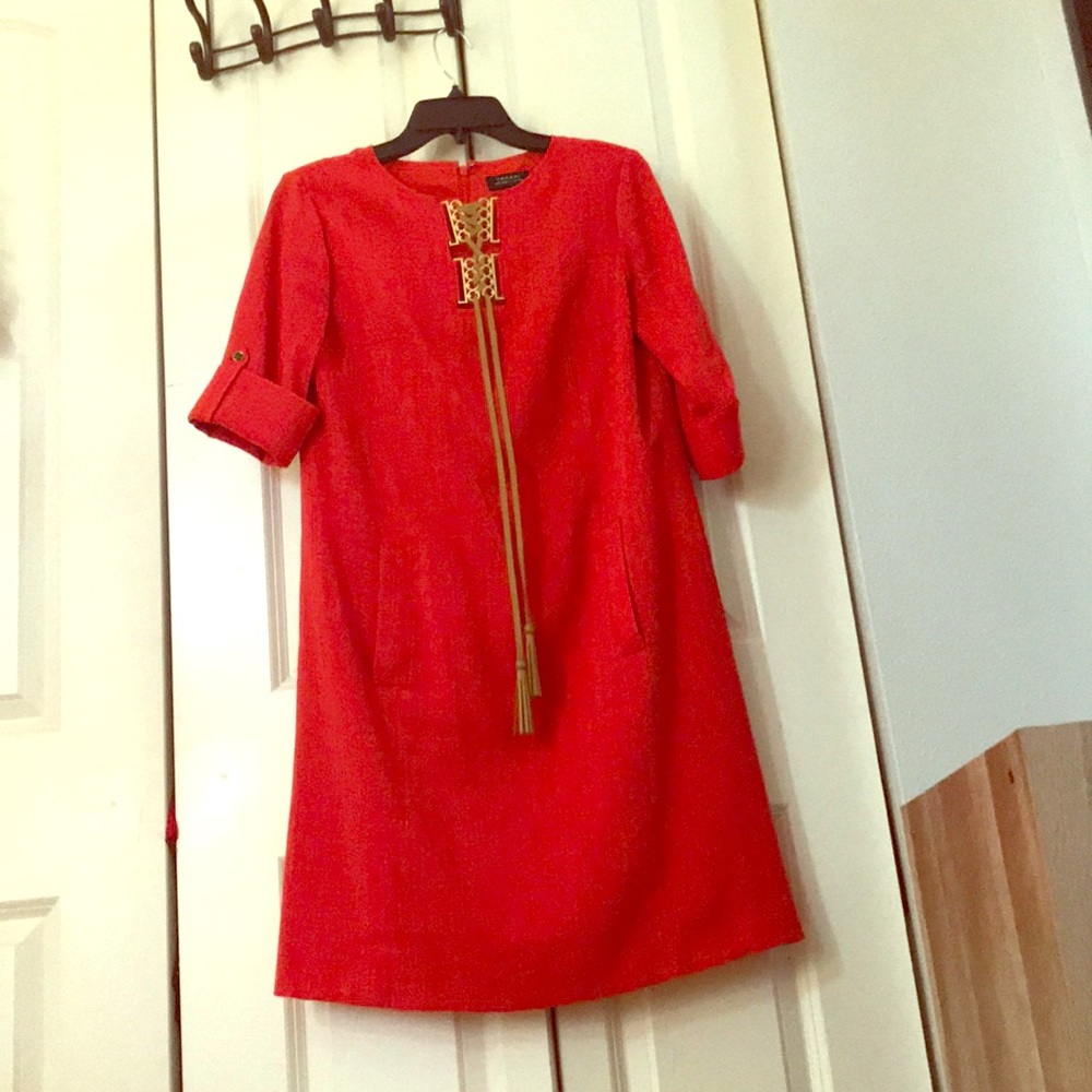 Red/orange dress.